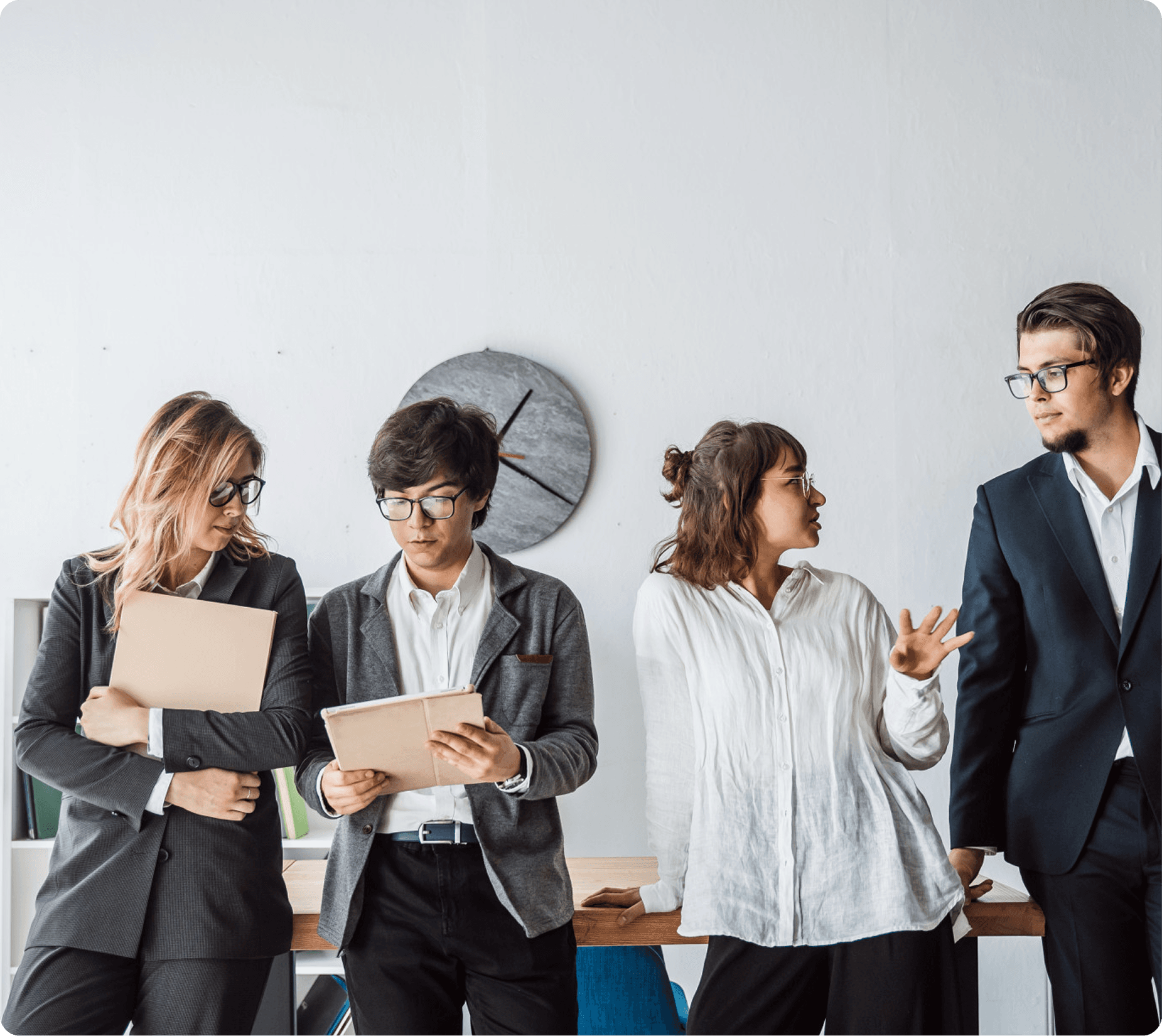 Team sitting at the table discussing
